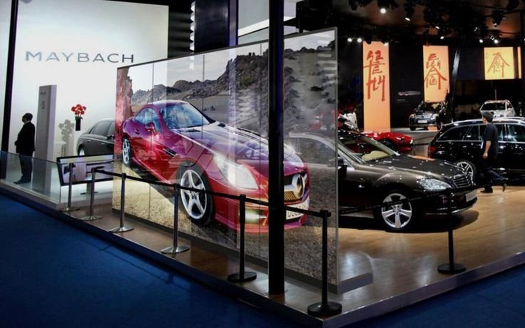 transparent led screen on a car showroom fixed by lingqi